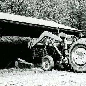 05_14_1973_Ray_Myers_shown_moving_a_log_at_his_one_man_sawmill._It_is_a_complete_operation_from_tree_to_board_website-3851