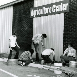 05_14_1975_Senior_4_H_members_assist_in_completing_the_Ag_Center_ornamental_planting_project._Agent_Seymour_supervises_website-4833
