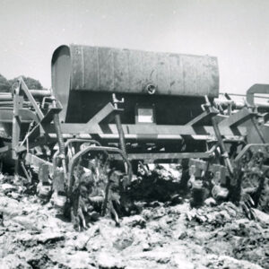 05_16_1963_Kenneth_Putt_Strip_process_corn_planter._the_processing_units_are_attached_to_the_front_of_the_planter._Each_unit_prepares_an_8_inch_seed_bed__website___Copy-1144