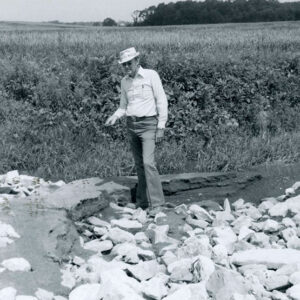 06_00_1981_Dean_Swigert_checks_sedimentation_damage._Rock_lined_waterway._Krietmeyer_Farm_website-5246