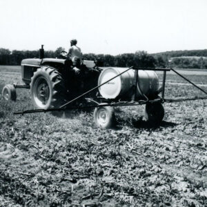 06_04_1975_Man_on_tractor_applying_liquid_to_field_website-591
