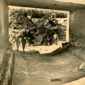 06_22_1964_Ben_Van_Zoest_contract_supervisor_for_the_Celeryville_Conservancy_District_checks_bridge_floor_construction_website-2658