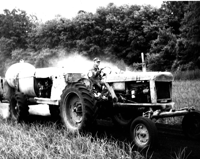 June 26, 1971
John Swartz spraying onions
Photo ID#: A403