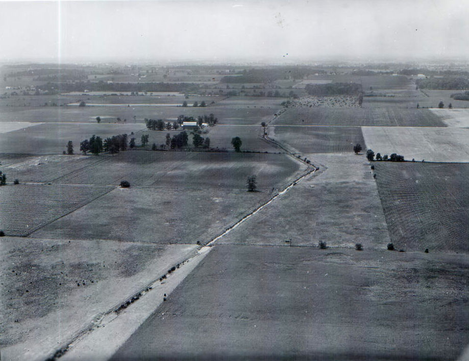 June 28, 1962
Marsh Run 2
West toward Champion Run Road. Floyd Champion buildings on left. Roy Faulkner land on right
Photo ID#: W11
