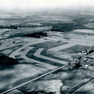 06_28_1962_View_of_John_Maurer_s_strip_cropping_along_Route_13_just_north_of_airport_website-5127