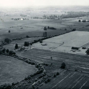 06_28_1962_View_of_Marsh_Run_as_it_crosses_Sharp_Rd._Looking_southwest._Mike_Mackey_buildings_are_on_left__J.Sharp_buildings_are_in_the_right._website7-5439