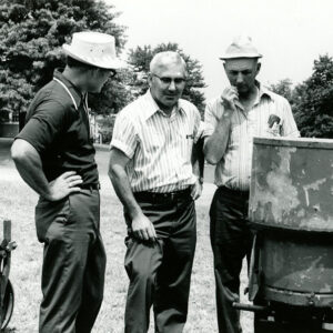 07_19_1972_Cliff_Olinger_Agricultural_technician_shown_discussing_equipment_with_James_Vines__L__and_Ralph_Winters__R__no_till_conference_at_the_Coshocton_station_website___Copy-1182