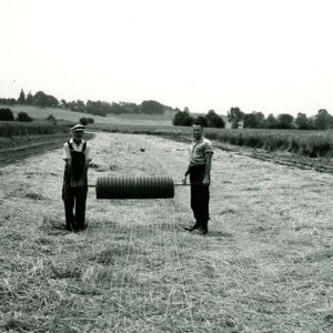 07_25_1967_Sod_waterway._Bryan_King_Farm._Bryan_King_and_Charles_Coleman_installing_mulch_netting_website-1387