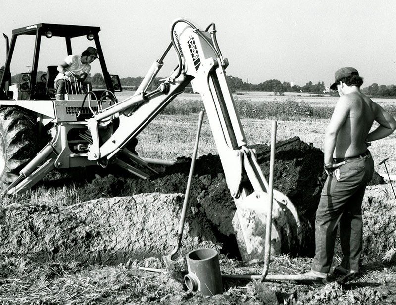 July 28, 1976
Rick Gosser installing drainage tile
Photo ID#: A722