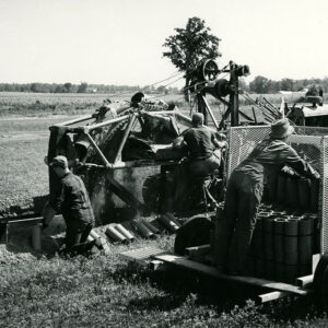 08_03_1965_Ed_Cook_farm._Ed_in_trench__Ronald_Cooke__son_of_Maurice__Fred_Cooke__on_sled___Ed_s_Susan_Cooke_on_tractor._New_chariot_tupe_trailer___palletized_tile_website-1313