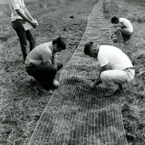 08_15_1978_Unidentified_men_installing_netting_at_unidentified_location_website-1396