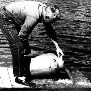 09_08_1966_Everett_Donough_stocks_fingerling_bass_at_the_Woods_and_Water_Christian_retreat_pond_website-3791