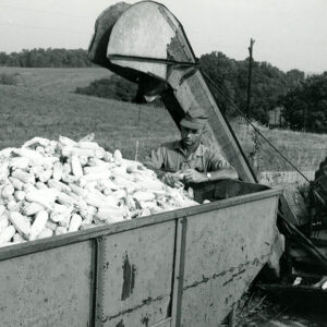 09_08_1970_Robert_Winters_shown_at_his_no_till_corn._Yield_exceeded_120_bu._per_acre_website___Copy-1187