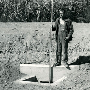 10_01_1963_Jim_Brinker_on_his_property_Richland_County_newly_completed_drop_inlet_concrete_outlet_structure_website-508
