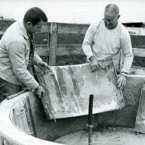 10_09_1967_LtoR_J.P._Haip___Carl_Mowry_as_they_remove_the_forms_from_their_poured_concrete_550_gallon_spring_development_tank_at_Carl_Mowry_Farm_website-1262