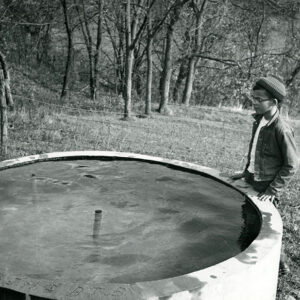10_23_1960_Tom_Mills_at_the_spring_development_tank__Thaburn_Brittan_Farm_in_Noble_Co._website-1265
