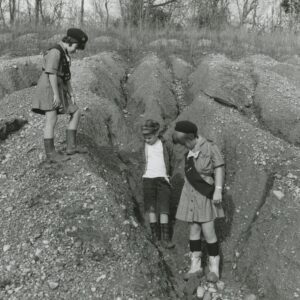 11_00_1968_L_R._Terry_Tom___Cindy_Jackson.Eroded_area_where_300_Boy___Girl_Scouts_planted_trees._See_back_for_more_info_0001-307