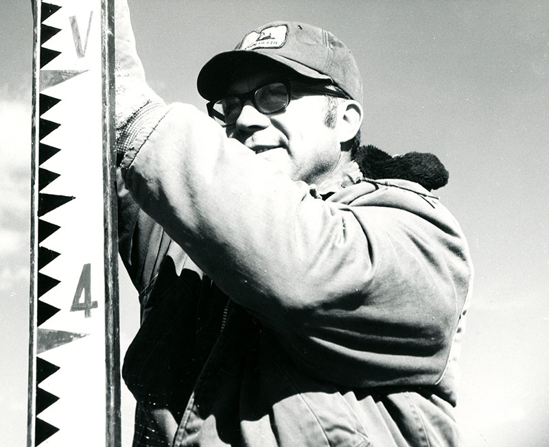 November 6, 1973
Harold Alt with the survey rod helps complete the layout of a shallow surface ditch designed for improved drainage
Photo ID#: A113