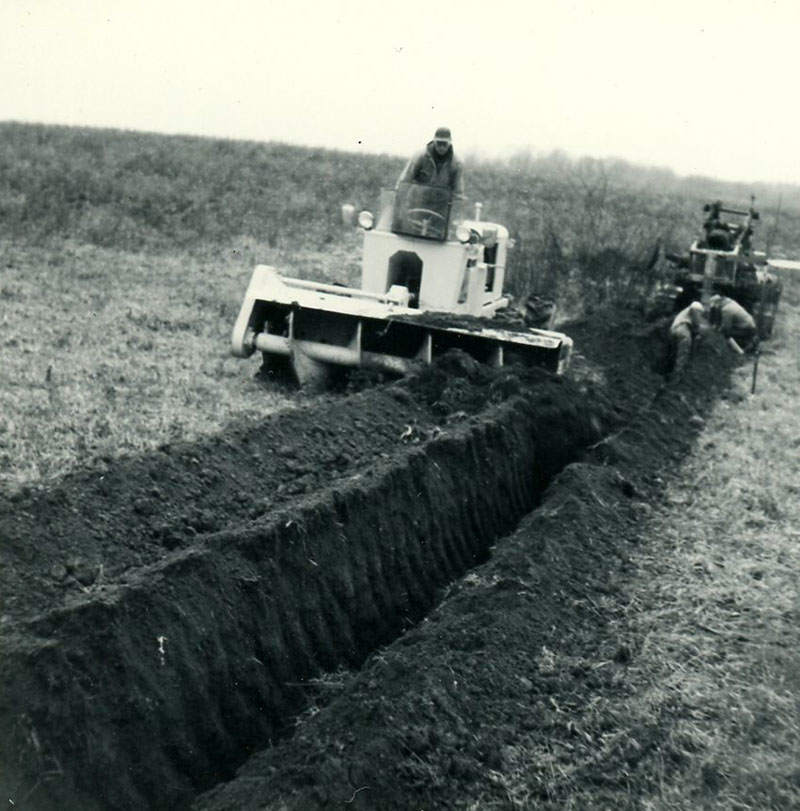 December 16, 1965
Equipment digging and filling ditch
Photo ID#: A771