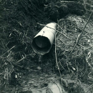 12_16_1965_Water_running_out_of_drainage_pipe_website-1360