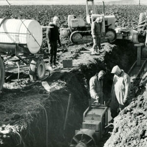 12_17_1971_Ambrose_Metger_at_his_farm_is_shown_as_the_crew_completed_boring_65_ft_under_the_railroad_in_order_that_a_12_in_outlet_drainage_tile_might_be_installed_website-1361