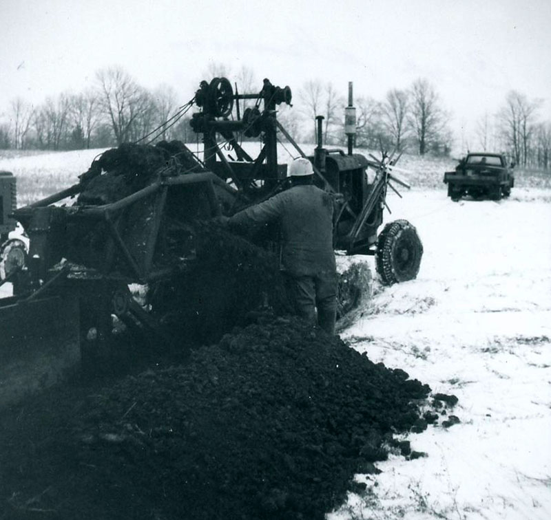 December 18, 1969
Cloyce Slessman at H. Isley Farm
Tile drainage
Photo ID#: A779