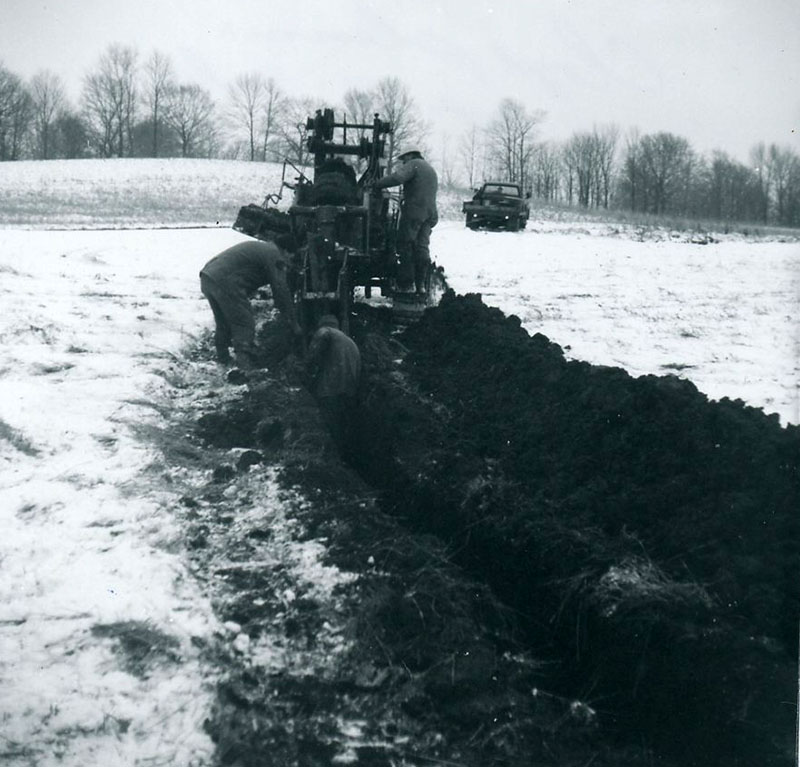 December 18, 1969
Cloyce Slessman at H. Isley Farm
Tile drainage
Photo ID#: A780