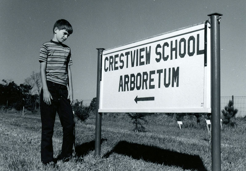 October 13, 1973
Tod Mills examines the new sign which identifies the Crestview High School Arboretum
Photo ID#: E86