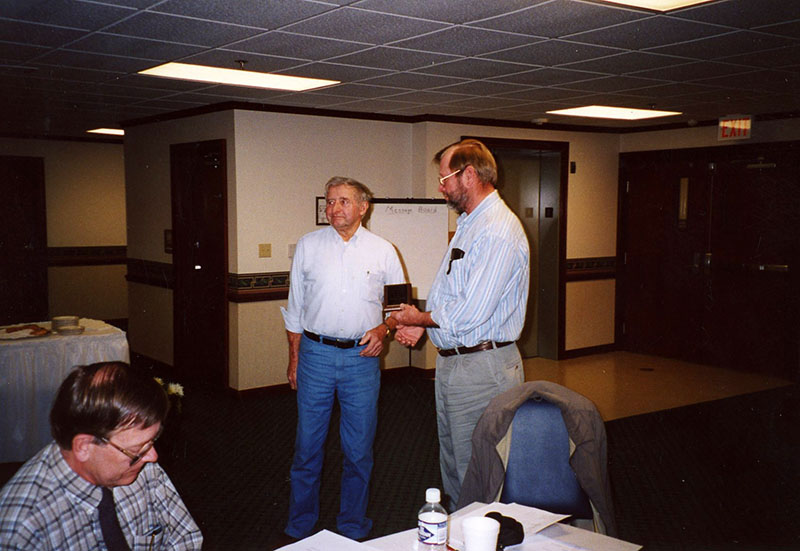 Dick Forbes and Eric Basin
Gary Small recieving an award
Photo ID#: RSWCD504