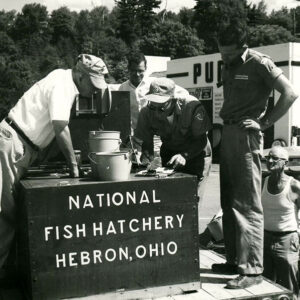 J.A._Brennan_Center_U.S._fish___wildlife_service__as_he_delivered_bass___bluegill_to__LtoR__Chester_Hampton__Davide_Westfield__Lynn_McCammon__Paul_Walker_of_Bellville_website-3799