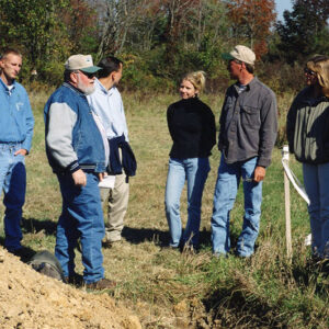 Land_Judging._Ten_men_and_women_around_pile_of_soil_Website-5052