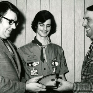Troop121._Scout_master_Thos.Callahan_is_receiving_plaque_from_Thomas_Kranz_Dist_Chmn_for_Outstanding_Service_to_Forestry._Looking_on_is_Sr_Patrol_leader_Guy_Guzzo_Website-4926